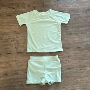 Kate Quinn swimwear set. Rash guard and trunks